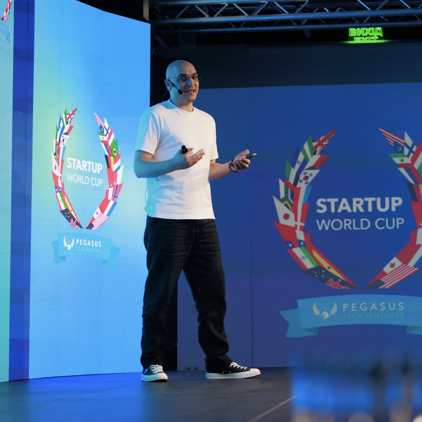 Founder pitching Psynex on the Startup World Cup stage